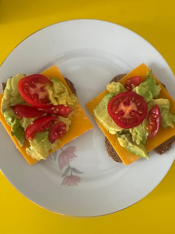 Open-faced sandwiches photographed on floral plate in Ramat Gan