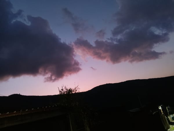 Twilight sky observed over Caracas hills Wednesday evening