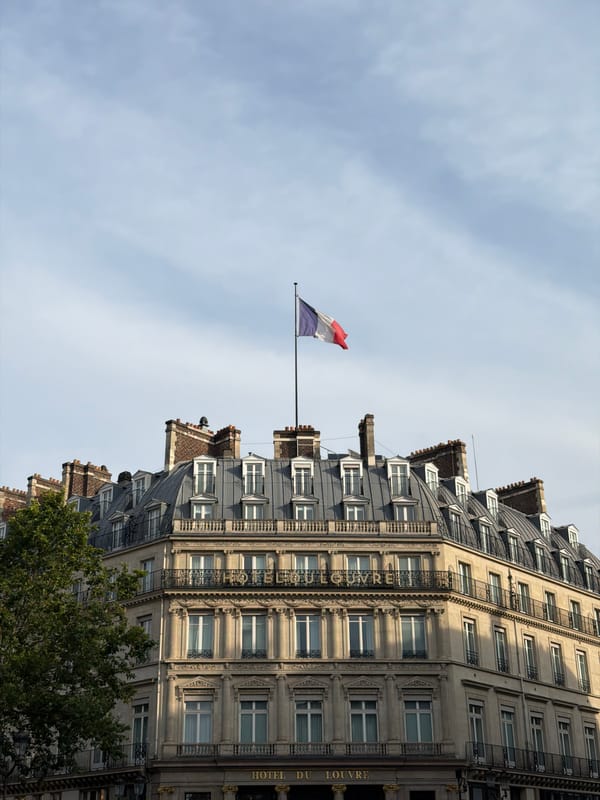 Street-level Paris: Hôtel du Louvre and Haussmannian boulevard