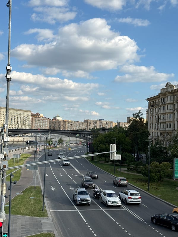 Central Moscow embankment: architecture, river views, and summer blooms
