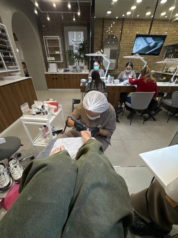 Client perspective captured at nail salon beauty studio