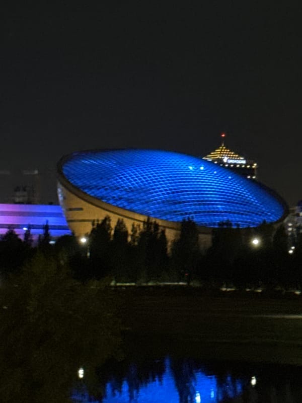 Nighttime stroll through Astana's illuminated modern landmarks