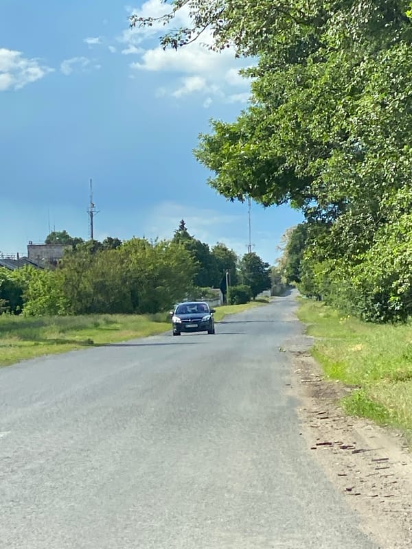 Rural drive through Ustyvytsia countryside documented during afternoon