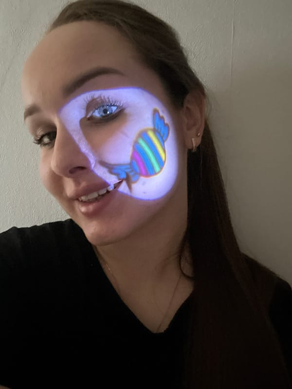 Woman participates in projection art session in Chaikovsky, Russia