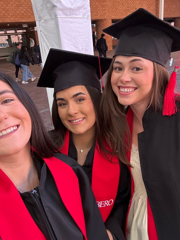Three graduates celebrate with selfie in Mexico City