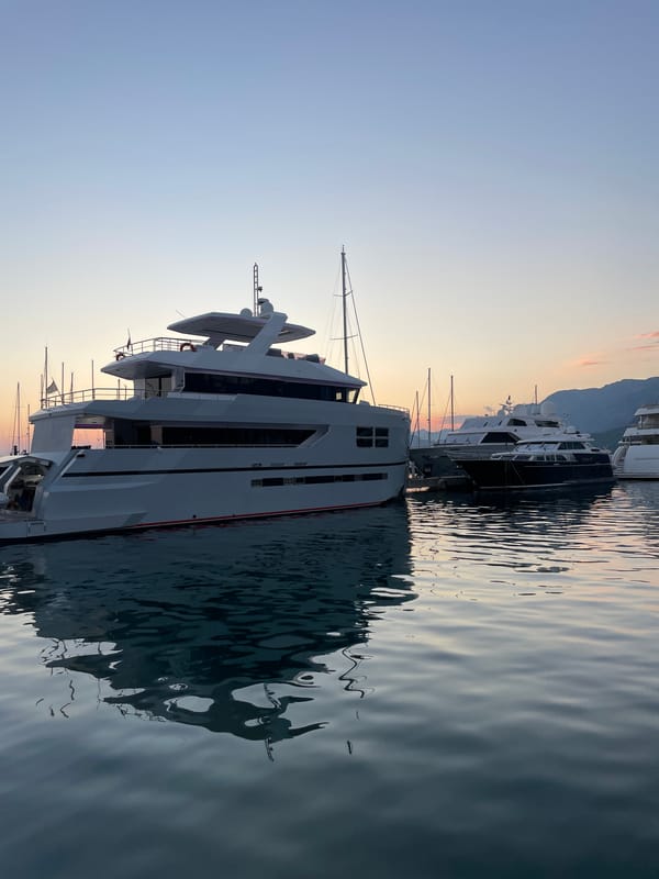 Sunset over Bar Marina, Montenegro — boats, mountains, golden light
