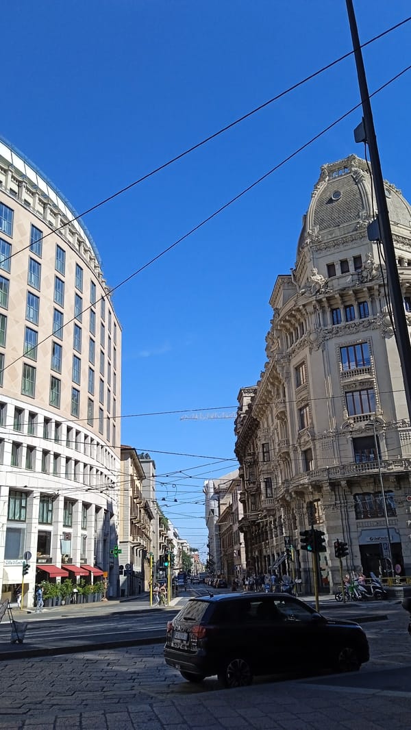 Street-level views of Milan's ornate residential and civic architecture