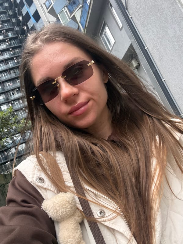 Woman takes selfies in elevator and outdoors in Batumi