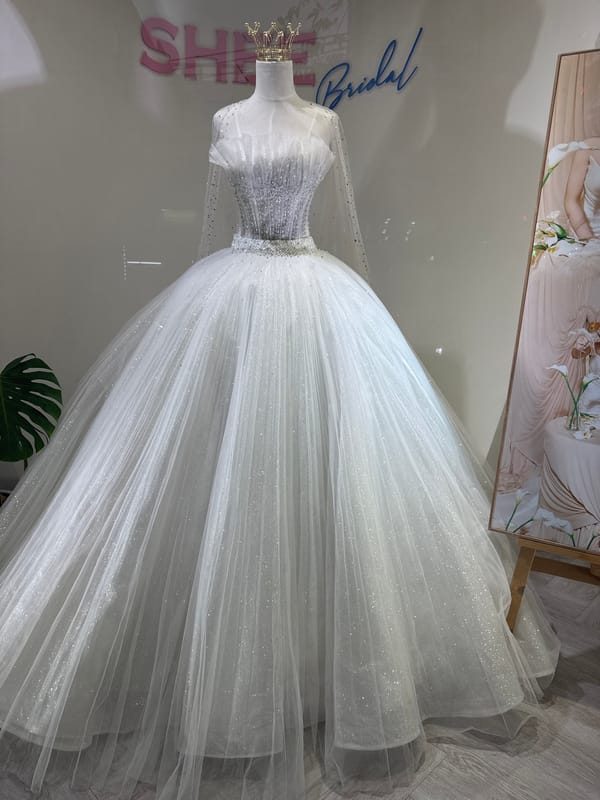 Guitar shop displays acoustic instruments on wall in Đà Nẵng