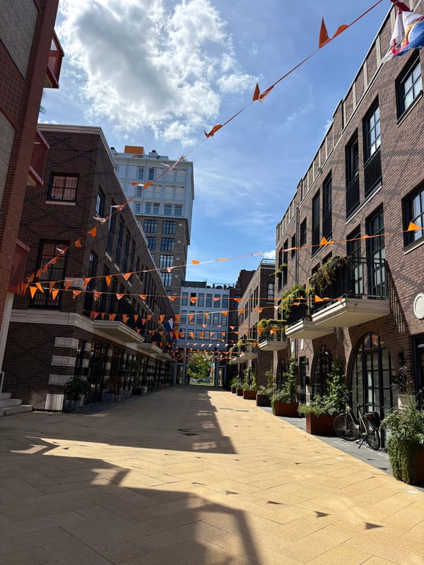Helmond streets and canal on a sunny afternoon in orange-flag season