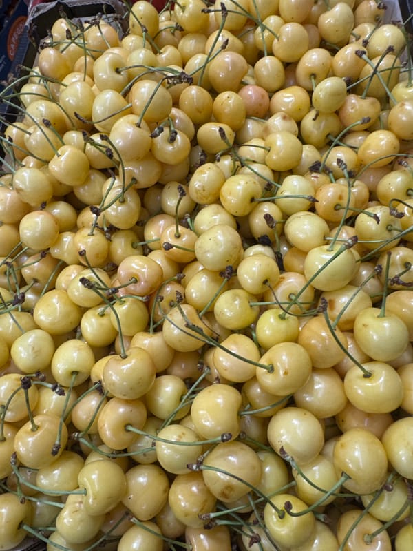 Colorful fruit and nut stall at a Ufa market