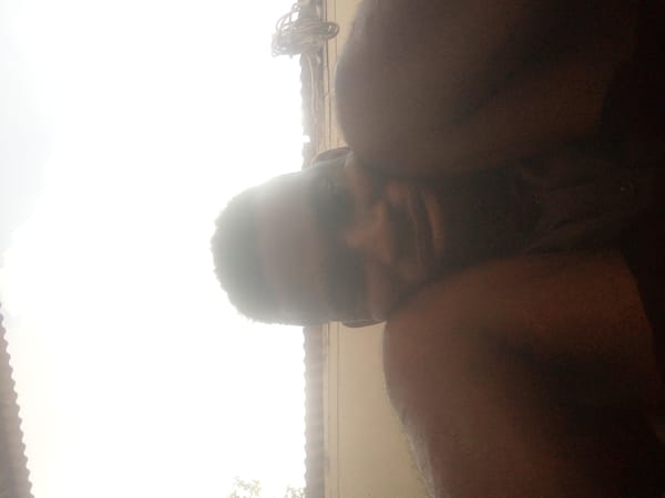 Person photographed in multiple close-up shots in Ikorodu
