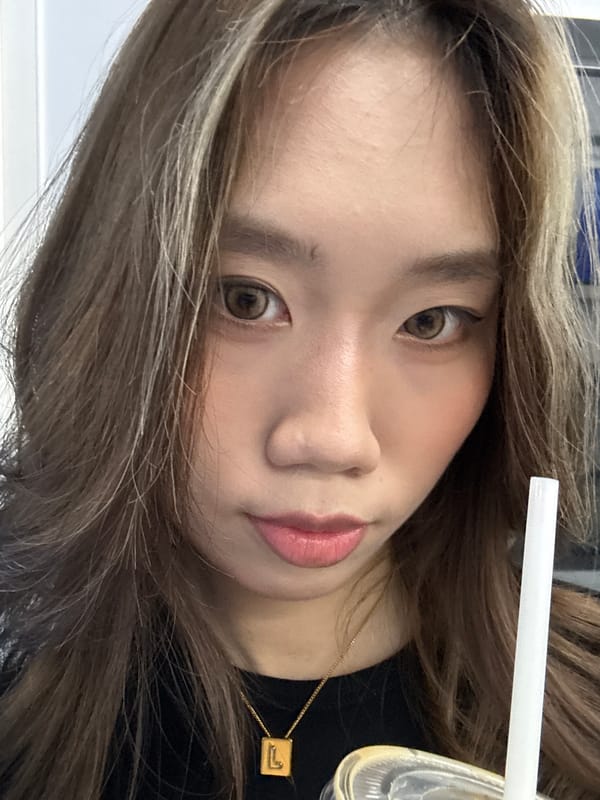 Woman enjoys beverage break in Nan'an District, China