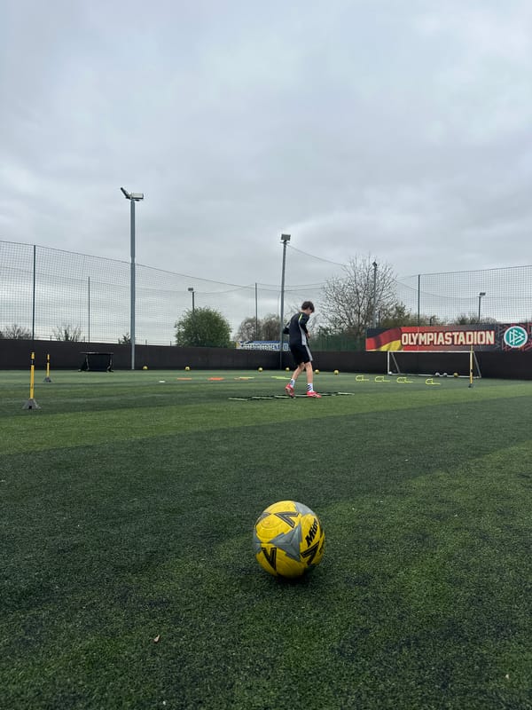 Soccer training session underway on artificial turf in Dartford