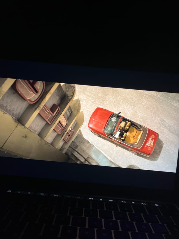 Red convertible spotted at Torrent city landmark, Spain