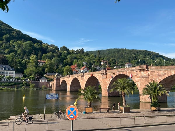 Heidelberg's old bridge and cobblestone streets on a June afternoon