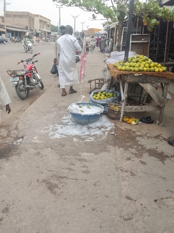 Daily street life unfolds in Arawa, Nigeria Saturday morning