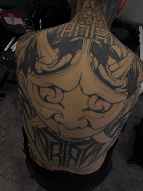 Tattooed individual spotted at Moscow studio session