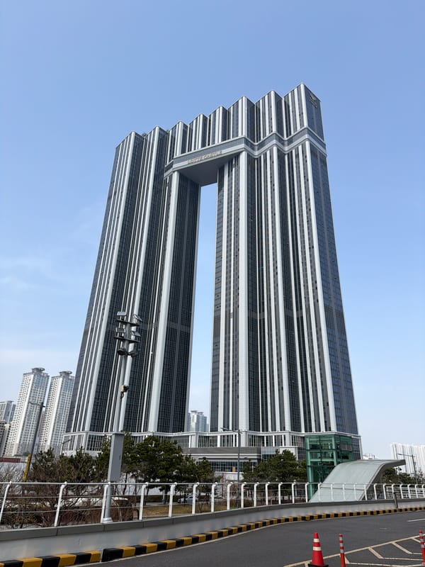 Dawn views capture Busan's landmark tower and ferry port