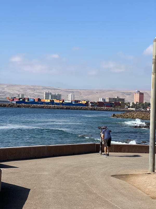 Evening sightseers gather at Arica waterfront on May 21
