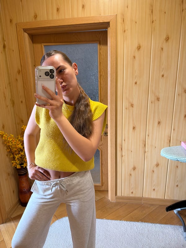 Woman Takes Multiple Selfies Indoors in Buhovo, Bulgaria