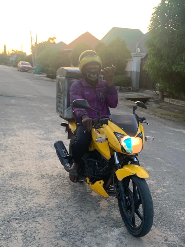 Evening street life documented across Abuja residential neighborhoods