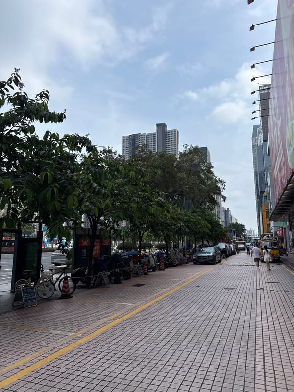 Guangzhou's Tianhe District: parkside paths meet skyscraper skyline
