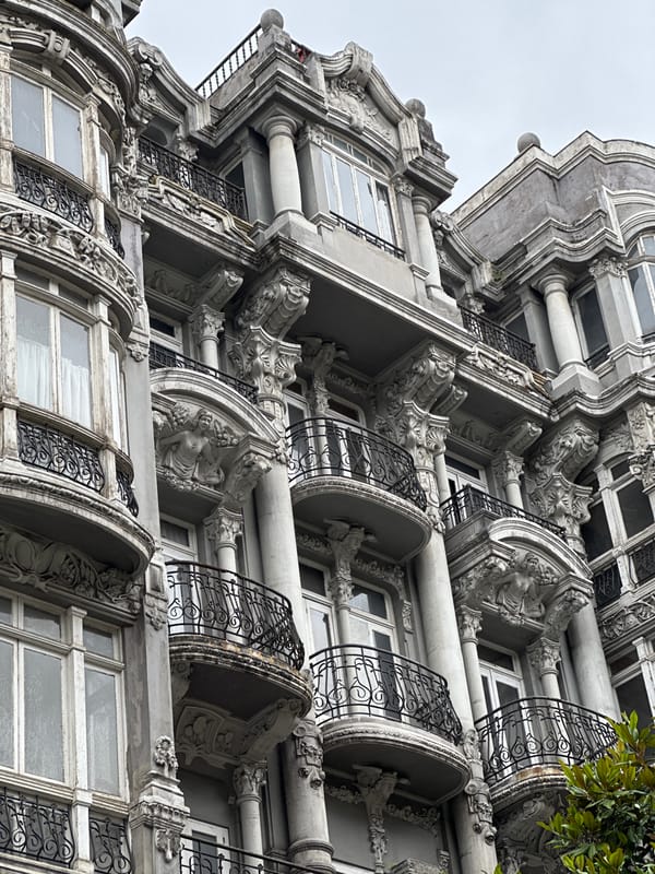 Tourist documents historic Oviedo landmarks and streets in Spain