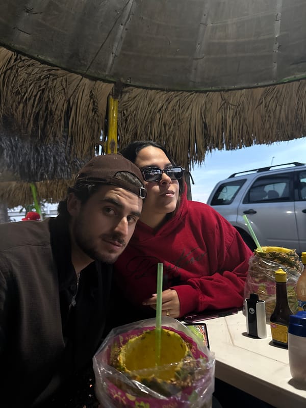 Pineapple drink vendors serve customers in Atlixco, Mexico