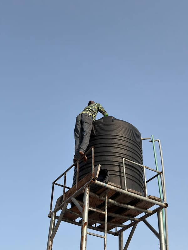 Person spotted on water tank in Igboefon, Nigeria