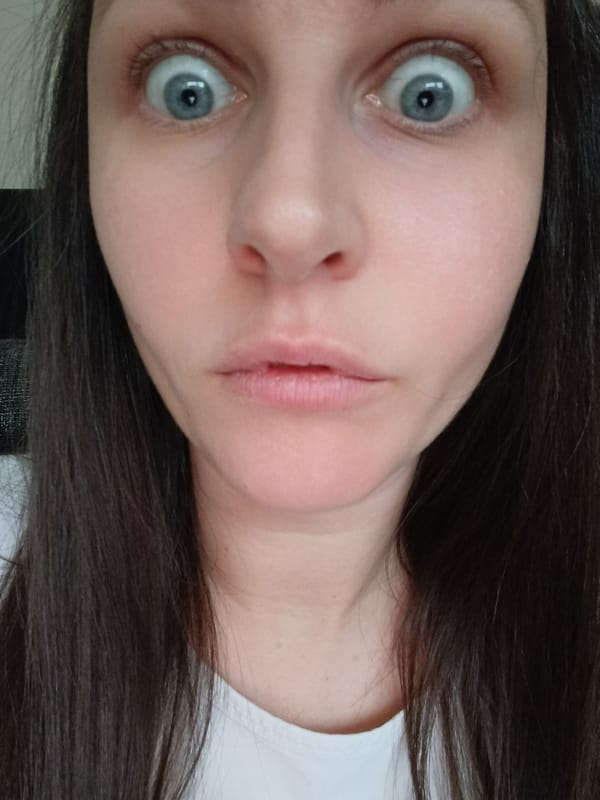 Woman photographed repeatedly in selfies with plush toy