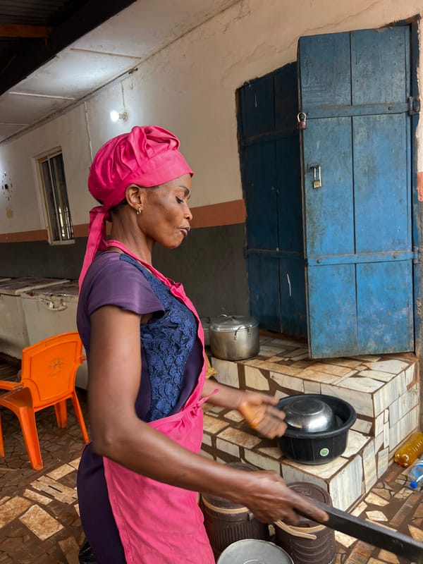 Morning chores and street cooking in Nkpor, Nigeria