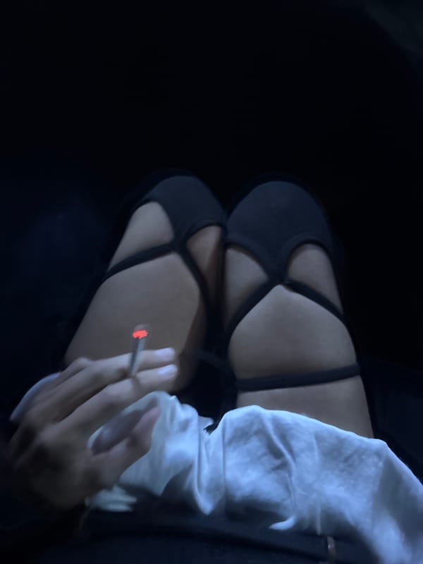 Person photographed seated from overhead in North Kuta