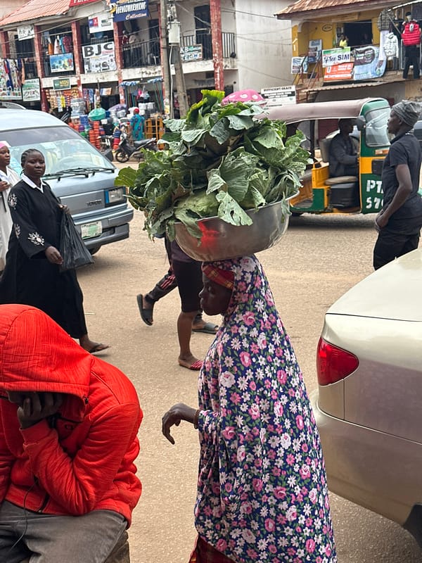 Daily market life unfolds on Bukuru streets