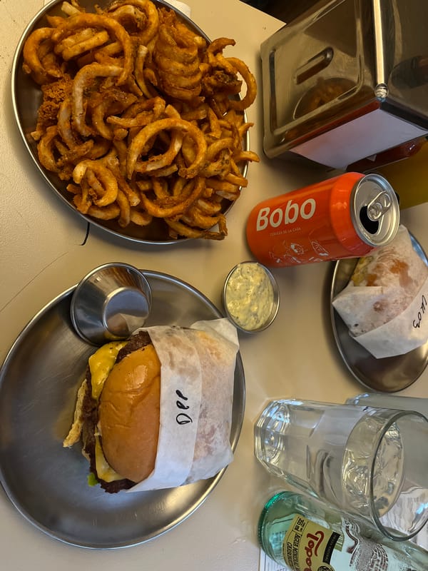 Late night burger meal documented at Mexico City restaurant
