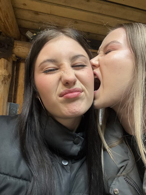 Playful social gathering captured in Russian wooden structure