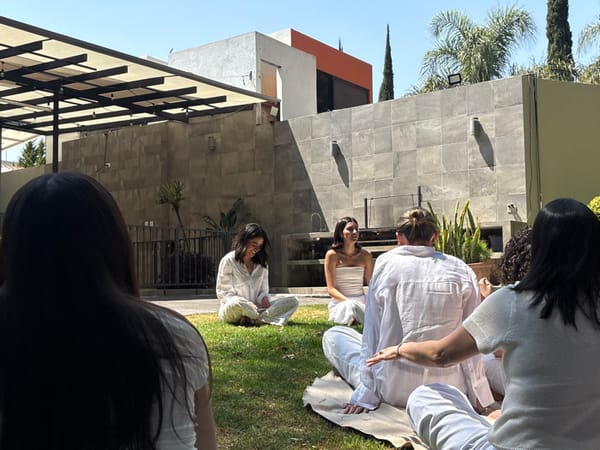 Women gather on residential lawn in Puebla, Mexico