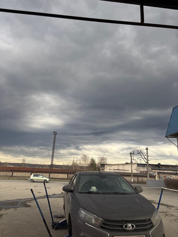 Lada vehicle spotted in industrial Perm under overcast skies