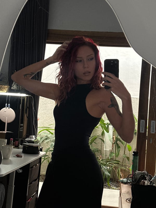 Woman takes mirror selfies in North Kuta, Indonesia