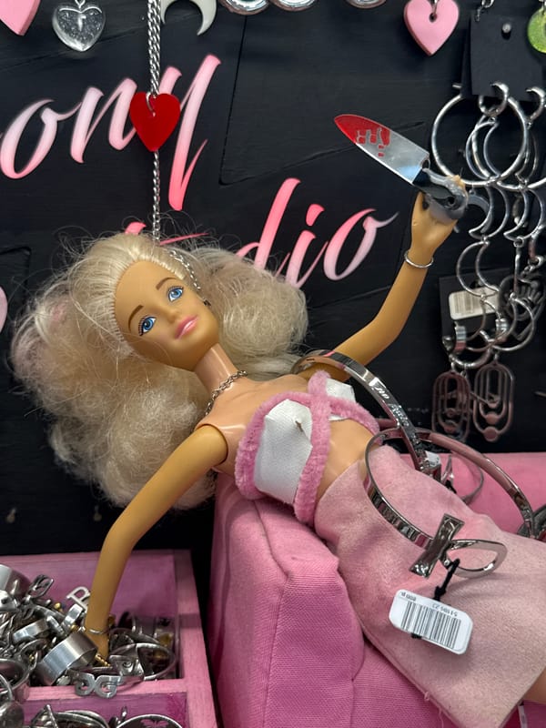 Moscow jewelry shop display styled with a Barbie doll prop
