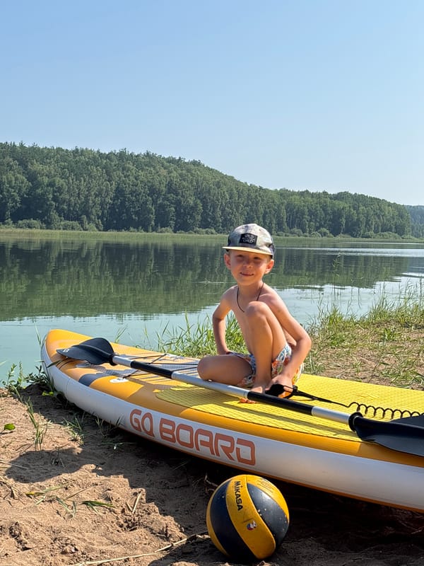 Paddleboard and volleyball day at a Chaykovsky lakeside