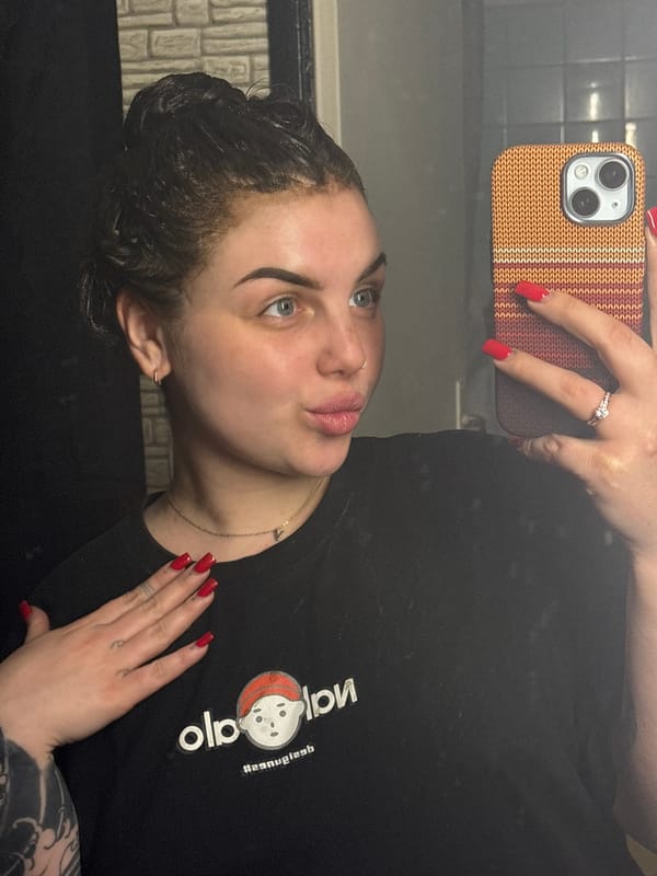 Woman takes bathroom selfies in Chornomorskoe, Ukraine