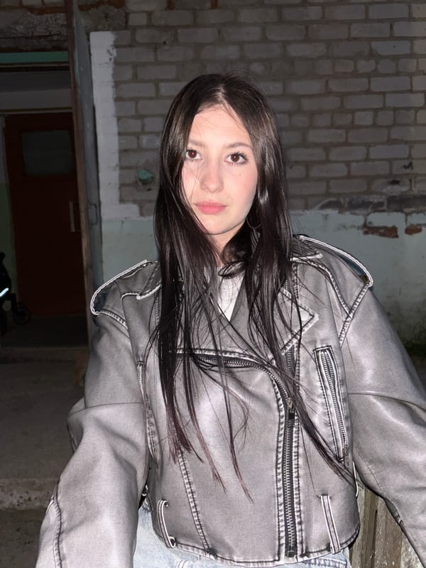 Woman takes selfie on street in Фоки, Russia
