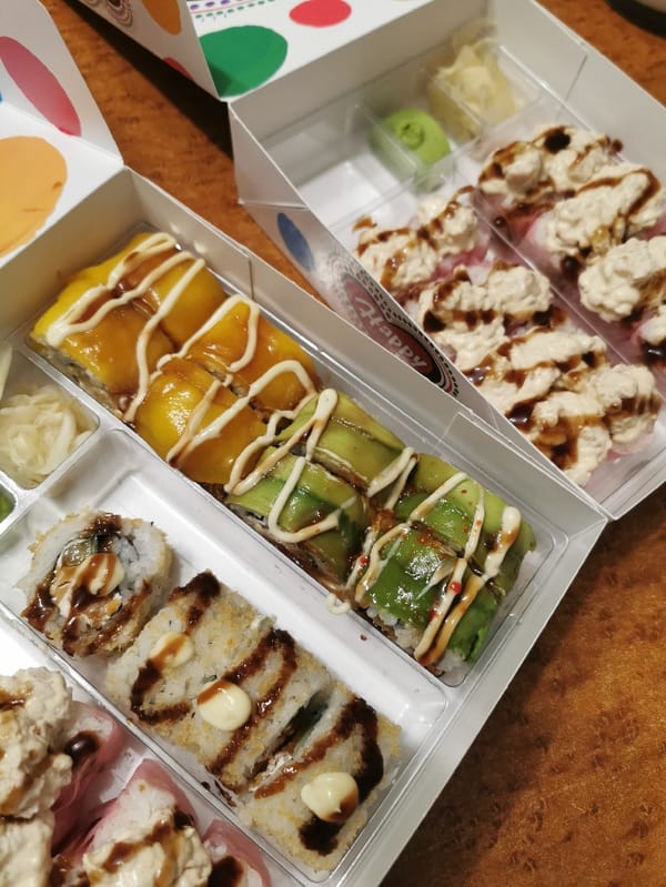 Takeout sushi containers photographed in Plovdiv, Bulgaria