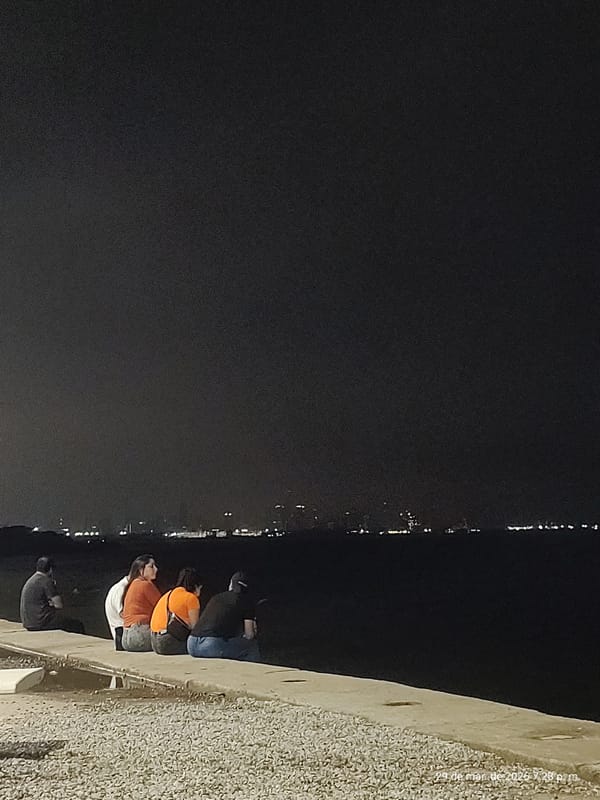 Evening gathering at Villa Domínico waterfront park draws visitors