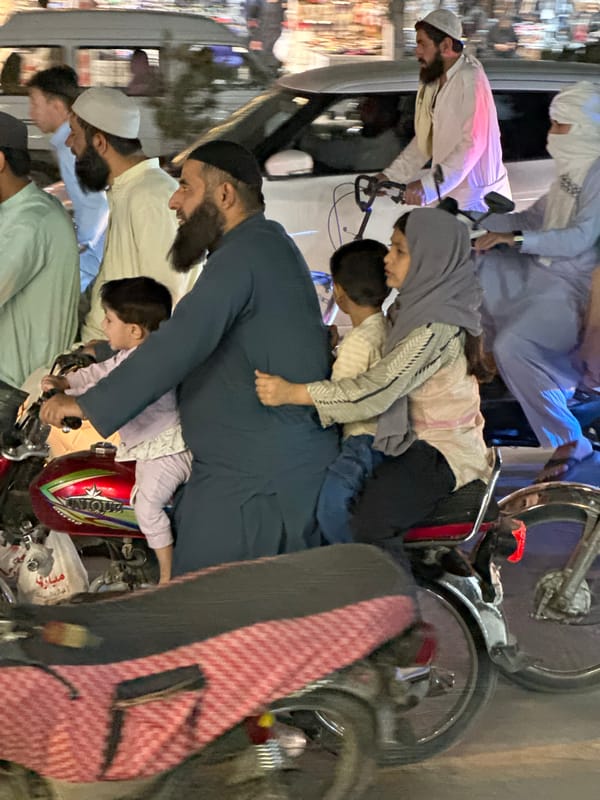 Evening street life documented in Quetta's commercial district