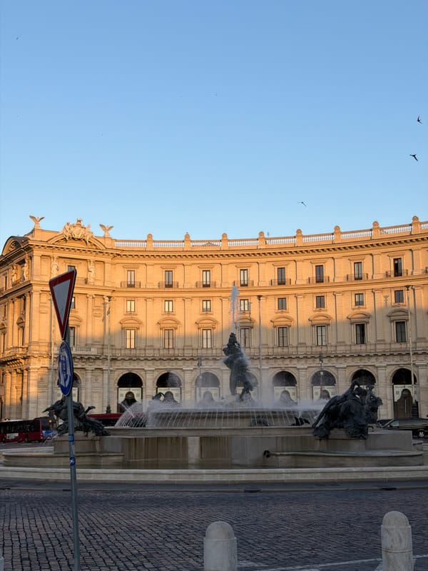 Ornate Roman plaza fountain at dusk, multiple angles
