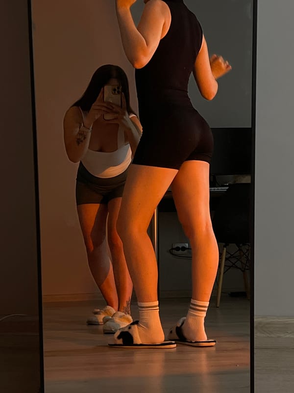 Mirror selfies captured in Ternopil residential spaces during evening