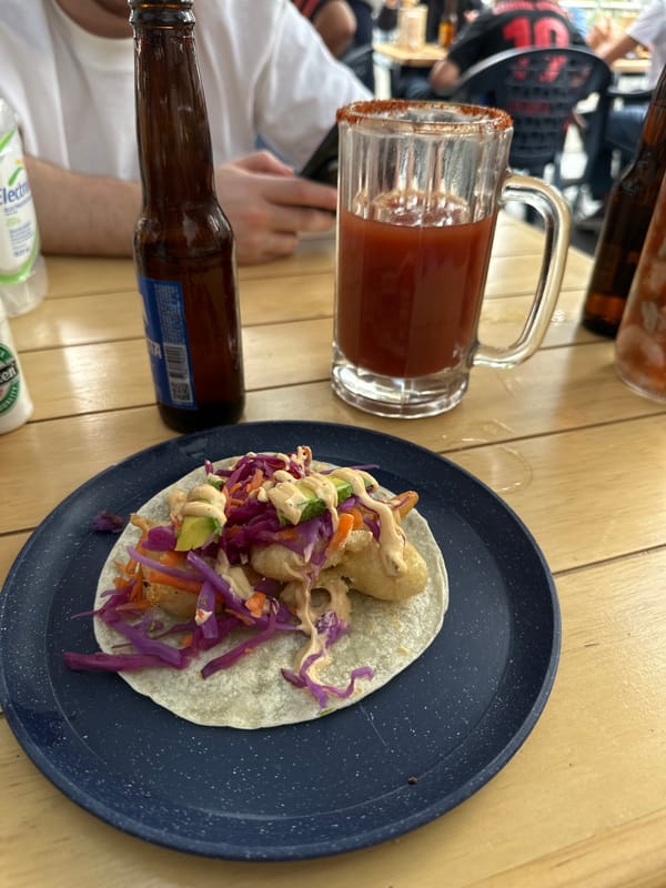 Evening patio gathering with dog captured in Mexico City