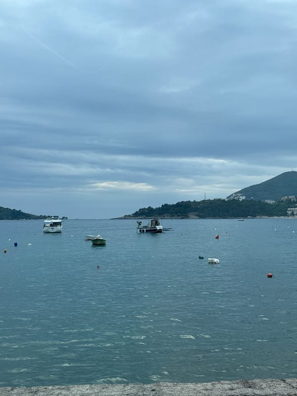 Tourist moments captured in Montenegro's Sveti Stefan coastal town